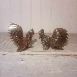 Vintage Solid brass fighting roosters.